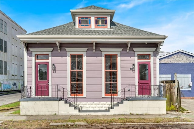 180002 Franklin Ave, New Orleans, LA 70117 - view of front facade featuring roof with shingles