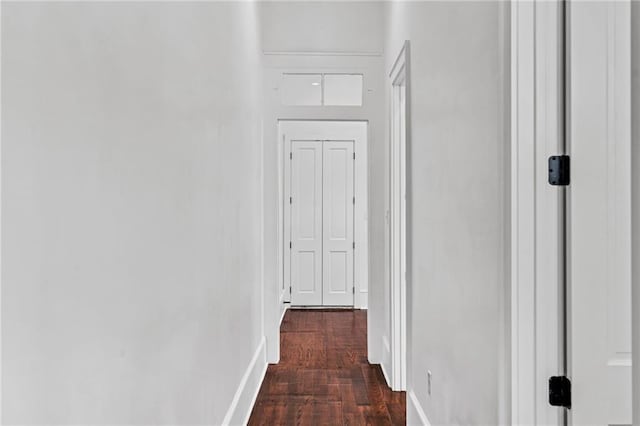180002 Franklin Ave, New Orleans, LA 70117 - hallway featuring baseboards and dark wood finished floors