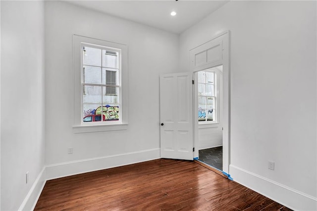 180002 Franklin Ave, New Orleans, LA 70117 - spare room featuring dark wood-type flooring and recessed lighting