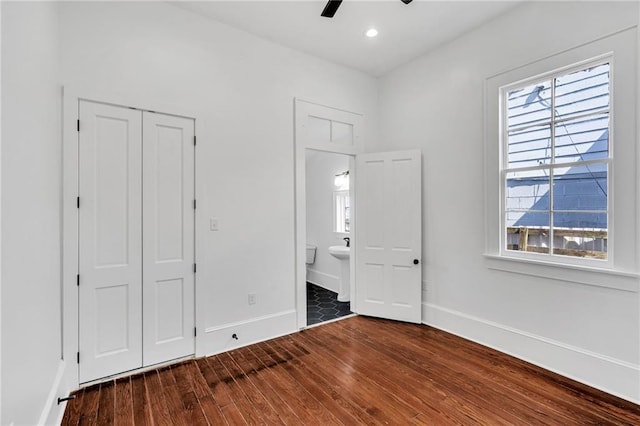 180002 Franklin Ave, New Orleans, LA 70117 - unfurnished bedroom with wood finished floors, ensuite bathroom, a closet, recessed lighting, and ceiling fan