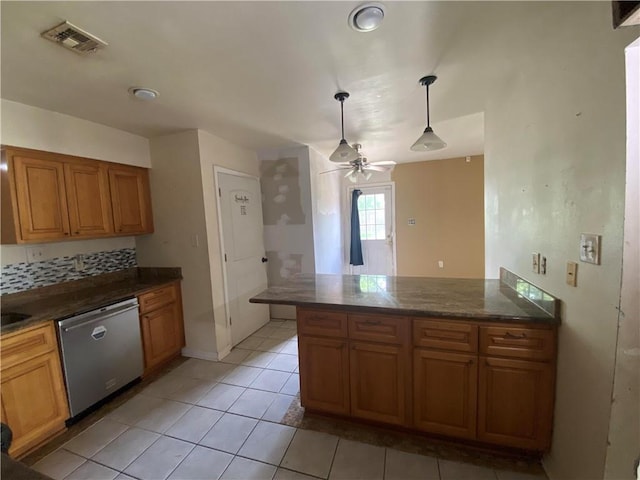 kitchen with ceiling fan, dishwasher, brown cabinetry, a peninsula, and visible vents