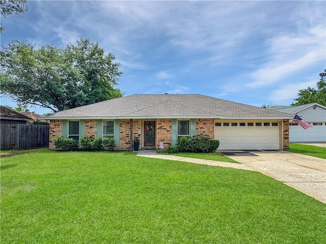 single story home with driveway, fence, a front lawn, an attached garage, and a shingled roof