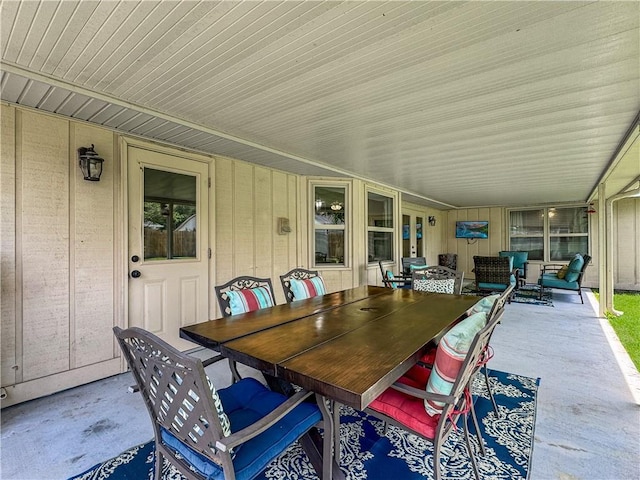 view of patio featuring outdoor dining space