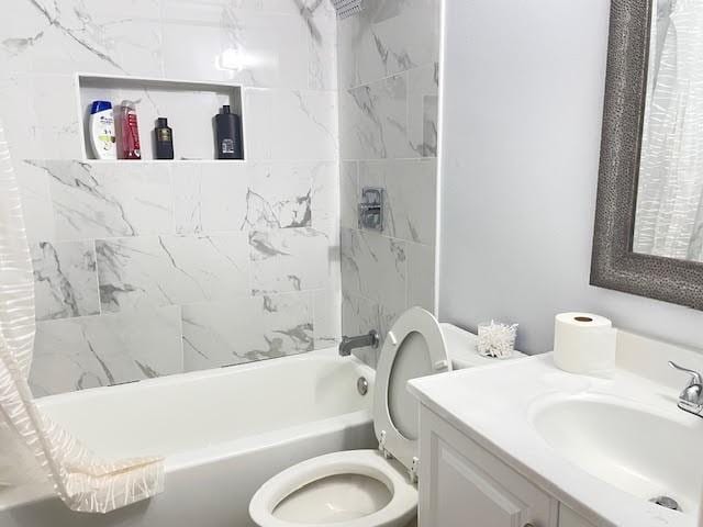 222 Adonis Way, Terrytown, LA 70056 - full bathroom with toilet, shower / bath combo with shower curtain, and vanity