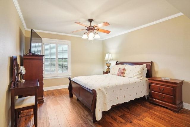 1500 W Esplanade Ave Unit 22B, Kenner, LA 70065 - bedroom featuring baseboards, ornamental molding, and dark wood finished floors