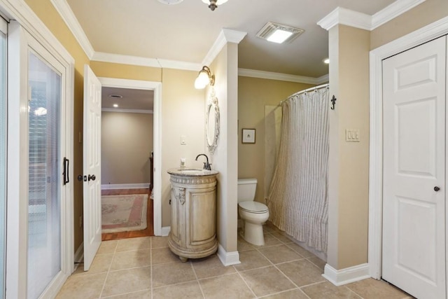 1500 W Esplanade Ave Unit 22B, Kenner, LA 70065 - bathroom featuring visible vents, crown molding, tile patterned flooring, vanity, and toilet