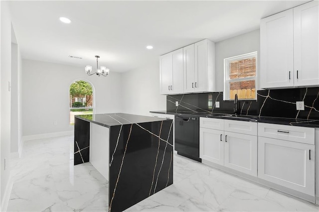 736 Glouster Pl, Gretna, LA 70056 - kitchen featuring recessed lighting, a sink, marble finish floor, and tasteful backsplash