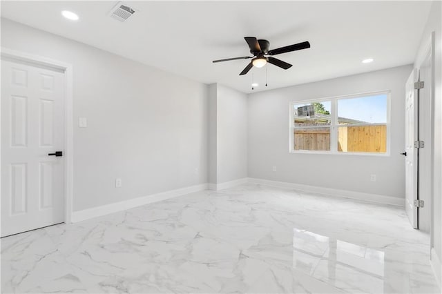 736 Glouster Pl, Gretna, LA 70056 - spare room with visible vents, marble finish floor, baseboards, recessed lighting, and a ceiling fan