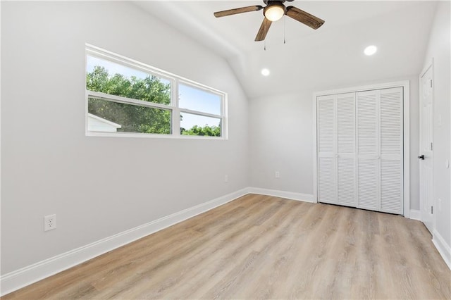 736 Glouster Pl, Gretna, LA 70056 - unfurnished bedroom with a closet, baseboards, recessed lighting, light wood finished floors, and vaulted ceiling