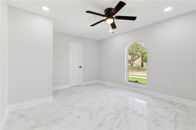 736 Glouster Pl, Gretna, LA 70056 - unfurnished room featuring baseboards, recessed lighting, marble finish floor, and a ceiling fan