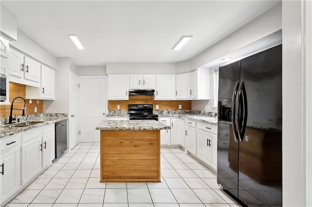kitchen featuring a center island, a sink, white cabinets, black appliances, and under cabinet range hood