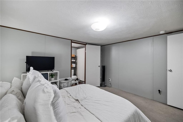 26272 Jim Bailey Rd, Holden, LA 70744 - bedroom with carpet flooring and a textured ceiling