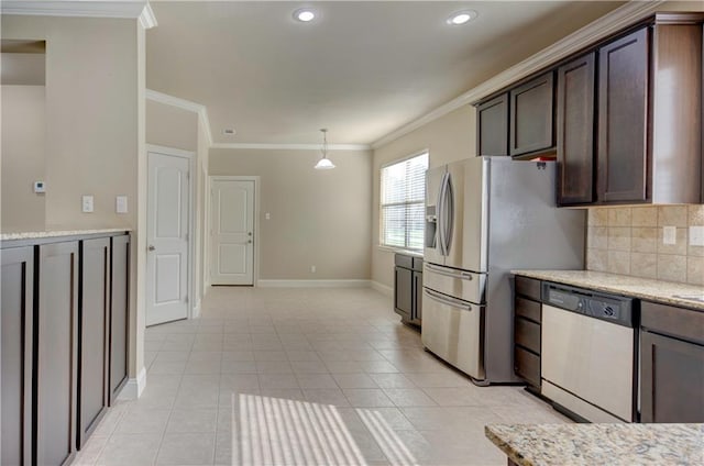 kitchen with dark brown cabinetry, crown molding, tasteful backsplash, baseboards, and stainless steel appliances
