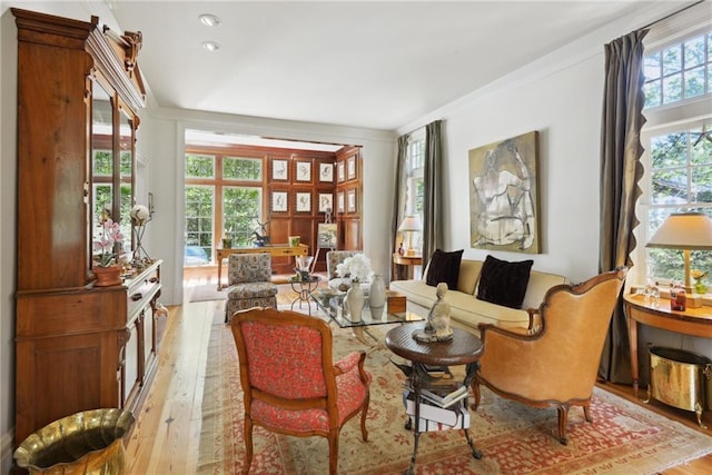 16407 Summerhill Rd, Covington, LA 70435 - living area featuring wood finished floors and crown molding