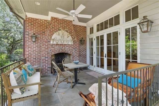 16407 Summerhill Rd, Covington, LA 70435 - view of patio with french doors, an outdoor brick fireplace, and ceiling fan