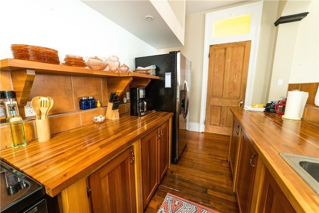 1418 Kerlerec St, New Orleans, LA 70116 - bar featuring stainless steel fridge, a dry bar, dark wood-style flooring, and a sink