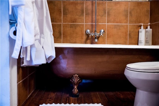 1418 Kerlerec St, New Orleans, LA 70116 - bathroom with wood-type flooring and toilet