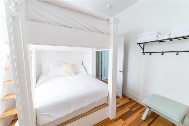 1418 Kerlerec St, New Orleans, LA 70116 - bedroom with light wood finished floors