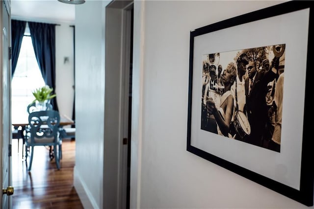 1418 Kerlerec St, New Orleans, LA 70116 - corridor featuring baseboards and dark wood-style flooring