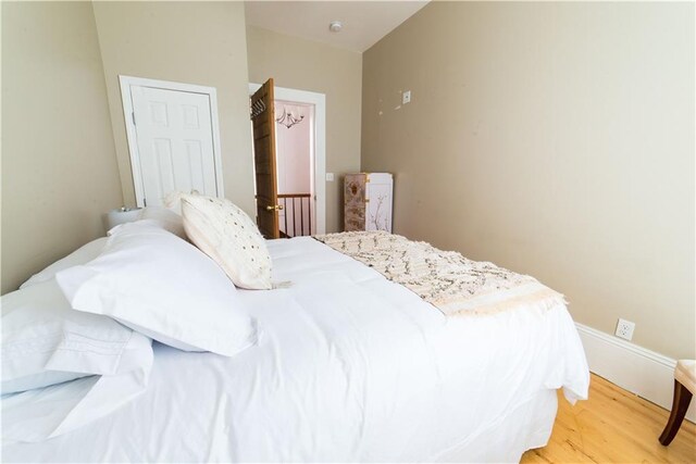1418 Kerlerec St, New Orleans, LA 70116 - bedroom featuring light wood-style flooring