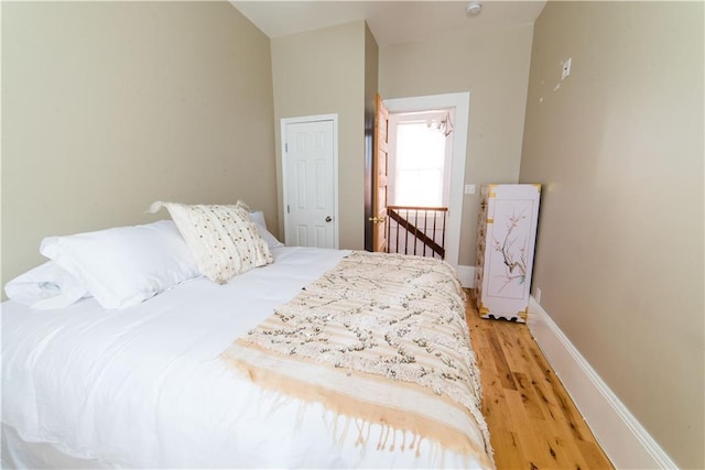 1418 Kerlerec St, New Orleans, LA 70116 - bedroom featuring baseboards and light wood-style flooring