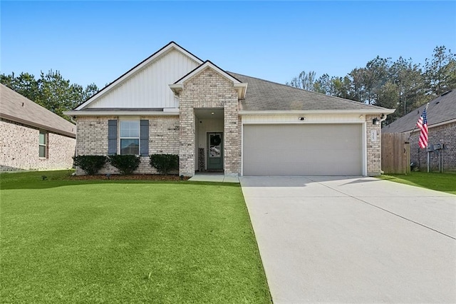 23162 Rosa Blvd, Robert, LA 70455 - ranch-style house featuring a front lawn, brick siding, driveway, and a garage