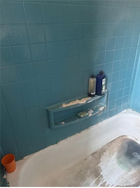 interior details featuring a bath
