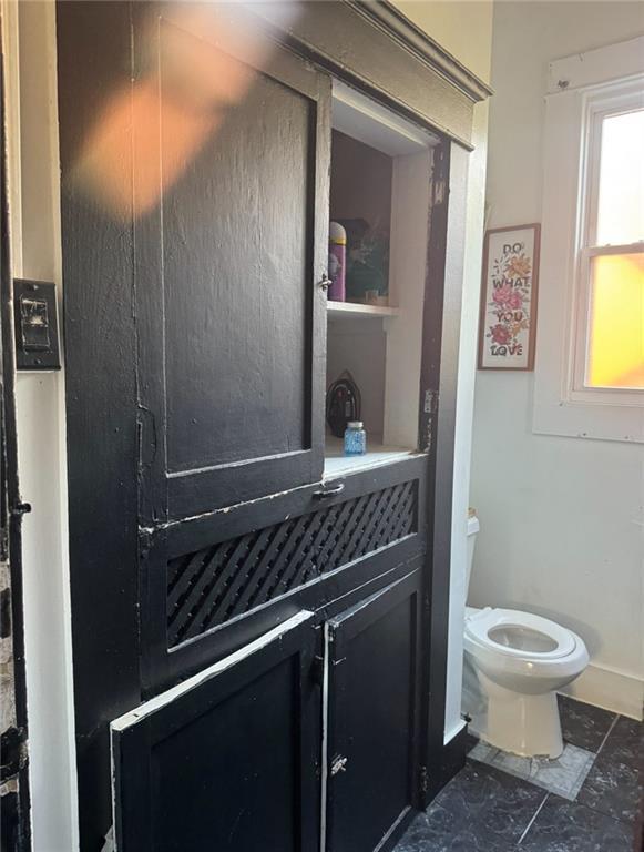 bathroom featuring toilet