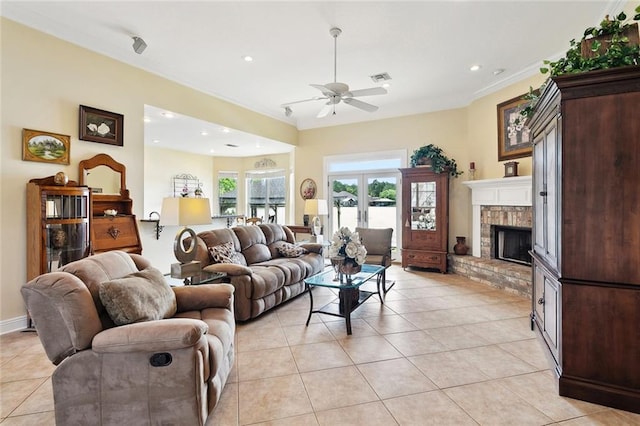14300 S Lakeshore Dr, Covington, LA 70435 - living area with ceiling fan, ornamental molding, light tile patterned floors, a fireplace, and recessed lighting