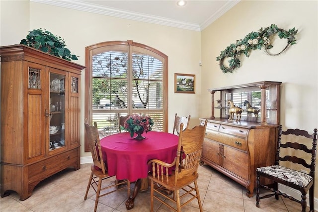 14300 S Lakeshore Dr, Covington, LA 70435 - dining space featuring crown molding, light tile patterned floors, and healthy amount of natural light