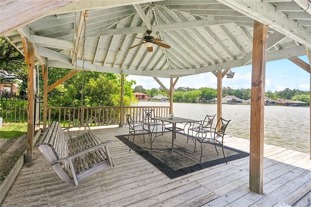 14300 S Lakeshore Dr, Covington, LA 70435 - wooden deck with a gazebo, a ceiling fan, and a water view