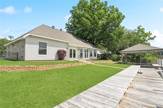 14300 S Lakeshore Dr, Covington, LA 70435 - back of property featuring a gazebo and a lawn