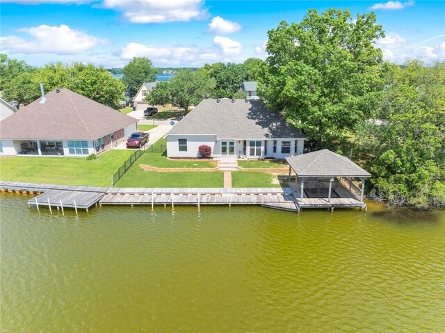 14300 S Lakeshore Dr, Covington, LA 70435 - dock featuring a water view and a yard