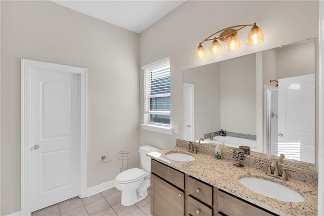 full bathroom with a bath, toilet, a sink, and tile patterned flooring
