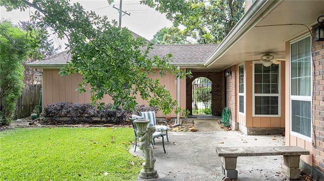 view of patio / terrace featuring fence