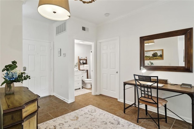 office featuring visible vents, baseboards, crown molding, and tile patterned floors