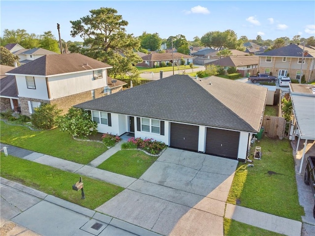 3205 Lake Trail Dr, Metairie, LA 70003 - view of front of home with a residential view, a shingled roof, a garage, a front yard, and driveway