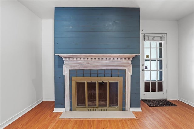 3205 Lake Trail Dr, Metairie, LA 70003 - interior details featuring baseboards, wood finished floors, and a tile fireplace