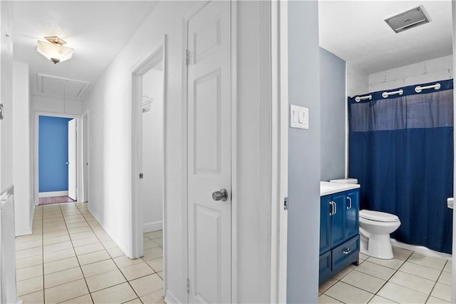 3205 Lake Trail Dr, Metairie, LA 70003 - bathroom featuring toilet, curtained shower, tile patterned flooring, and vanity