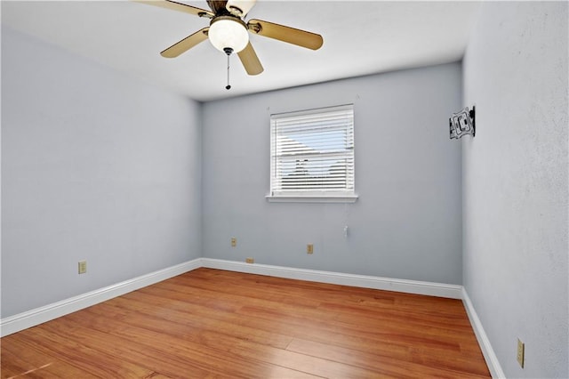 3205 Lake Trail Dr, Metairie, LA 70003 - empty room with a ceiling fan, baseboards, and light wood-style flooring
