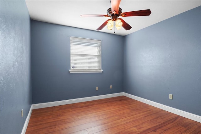 3205 Lake Trail Dr, Metairie, LA 70003 - unfurnished room featuring baseboards, a ceiling fan, and wood finished floors