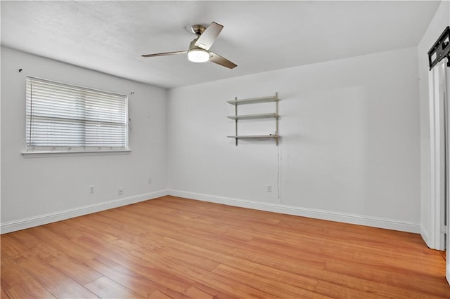 3205 Lake Trail Dr, Metairie, LA 70003 - unfurnished bedroom with baseboards, a ceiling fan, and light wood-type flooring