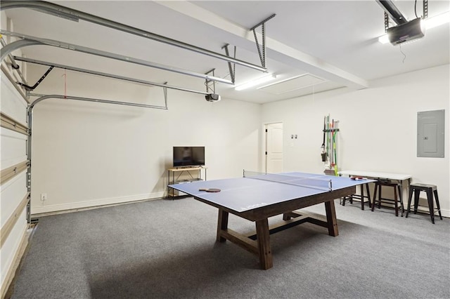 rec room featuring attic access, a garage, carpet, and electric panel