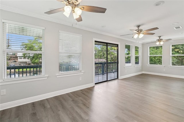 unfurnished sunroom with a wealth of natural light and visible vents