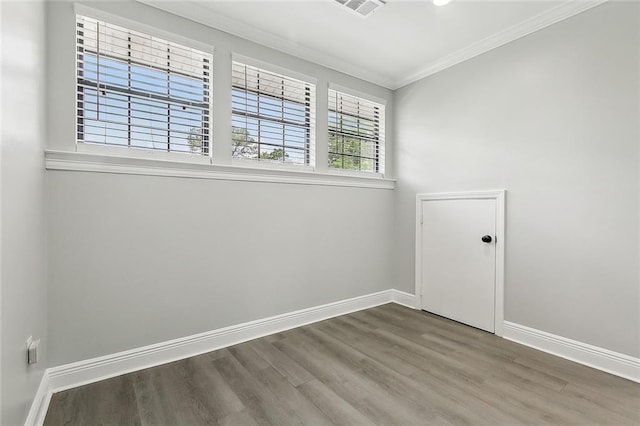 2951 Camellia Dr, Slidell, LA 70458 - unfurnished room with baseboards, visible vents, crown molding, and wood finished floors