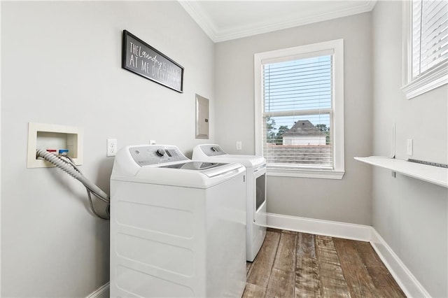 laundry area with laundry area, crown molding, baseboards, separate washer and dryer, and dark wood finished floors