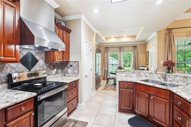 kitchen featuring crown molding, a sink, wall chimney exhaust hood, electric stove, and backsplash
