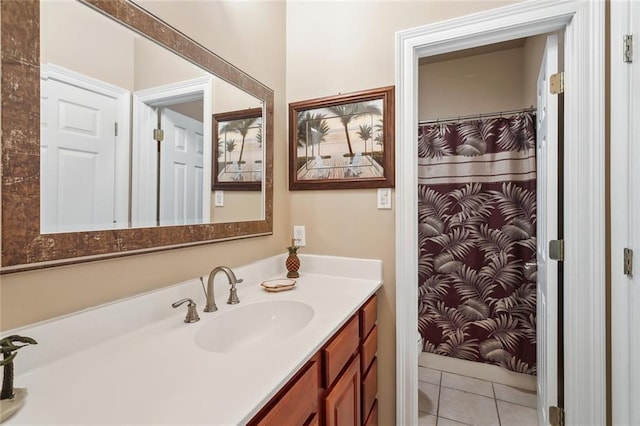 full bathroom featuring vanity, tile patterned flooring, and a shower with curtain