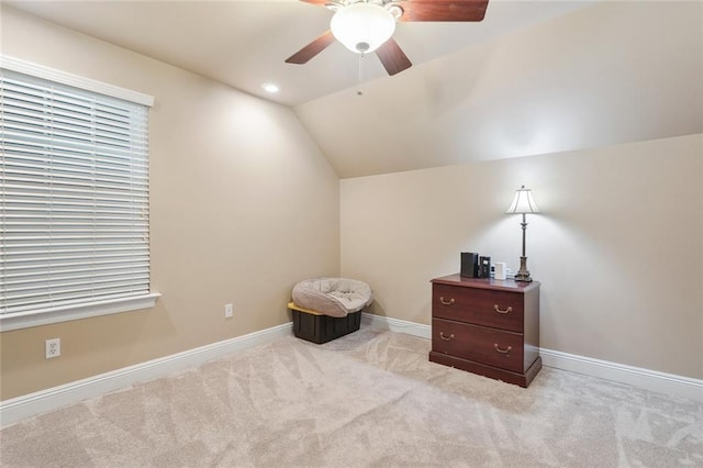 bedroom with baseboards, carpet, a ceiling fan, and lofted ceiling