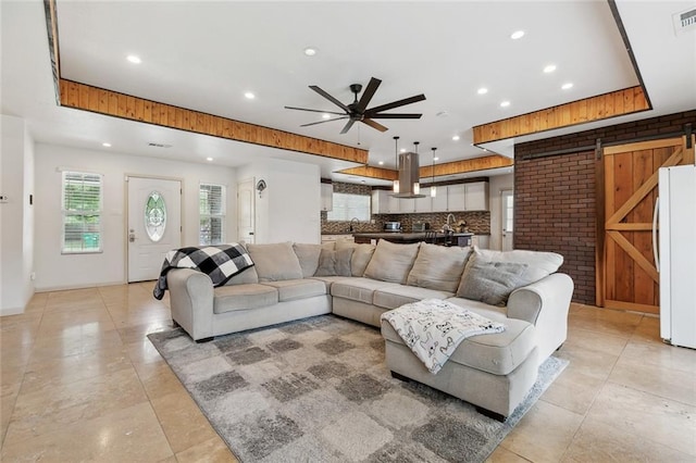 8752 Leisure Dr, Denham Springs, LA 70726 - living area with ceiling fan, recessed lighting, and visible vents